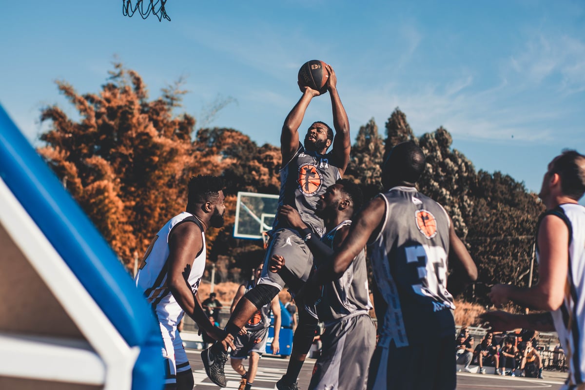 Men Playing Basketball